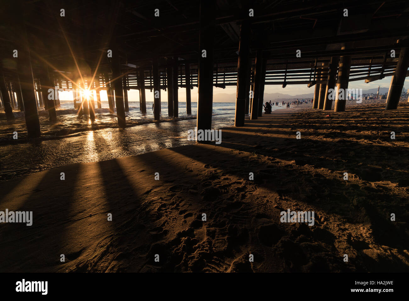 Sun Flare under Santa Monica Pier, California, USA Stock Photo