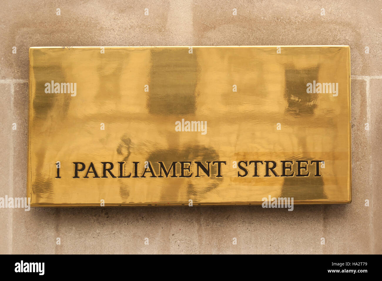 The address of 1 Parliament Street, on a metal plaque on the road side, London UK, October 2013 Stock Photo
