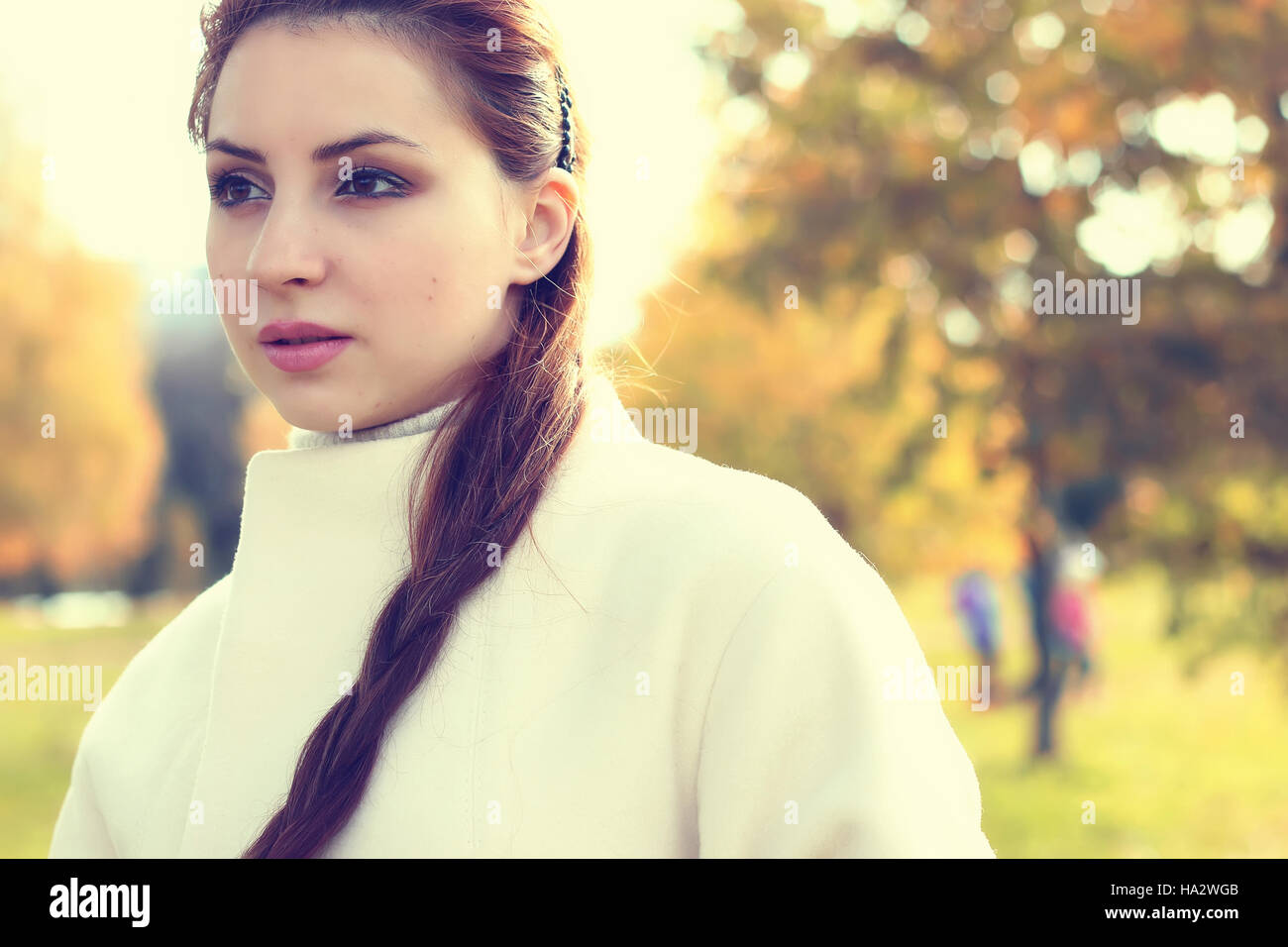 girl in a park walk autumn alone Stock Photo - Alamy