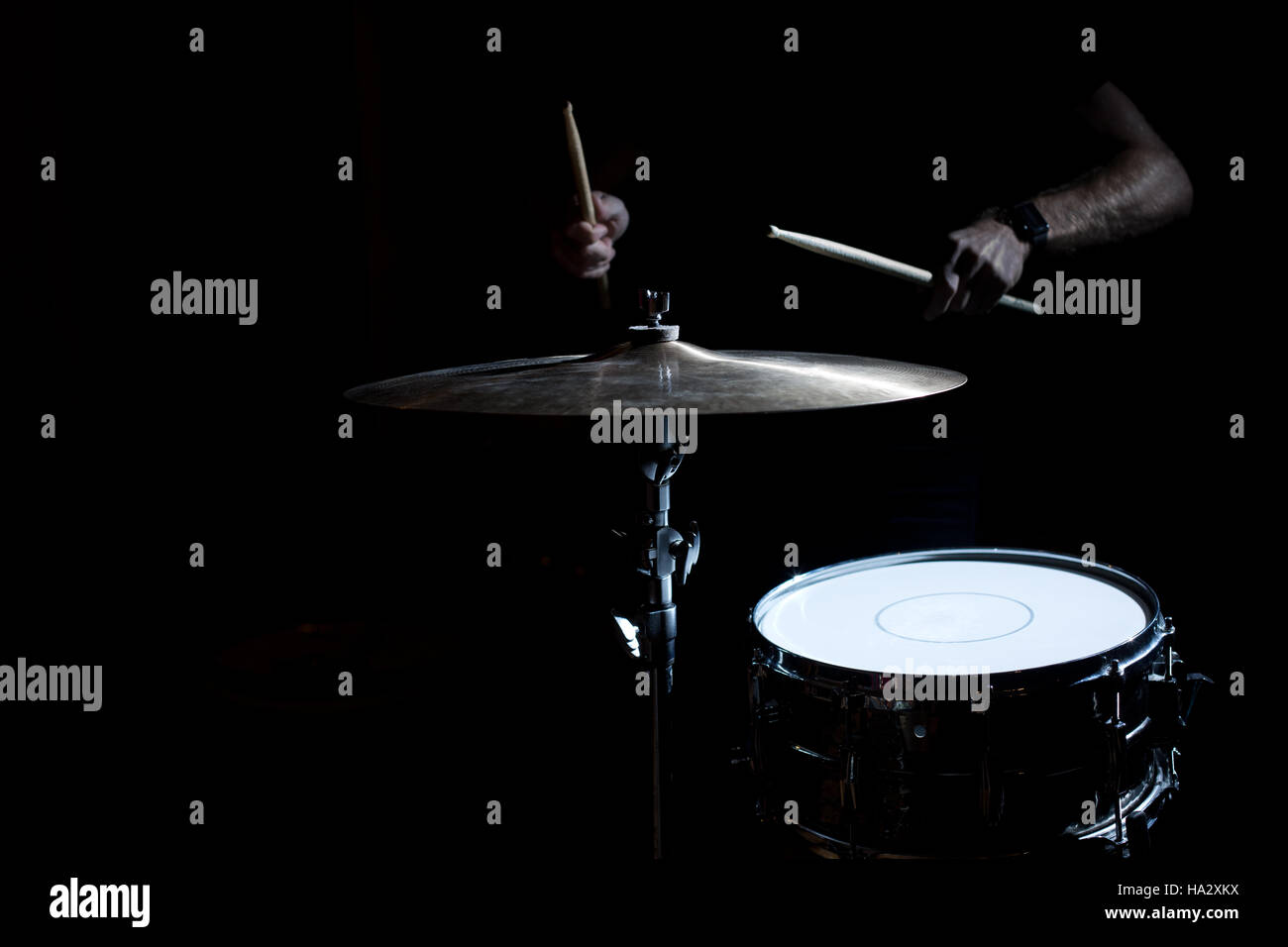 Man playing drums and cymbal Stock Photo