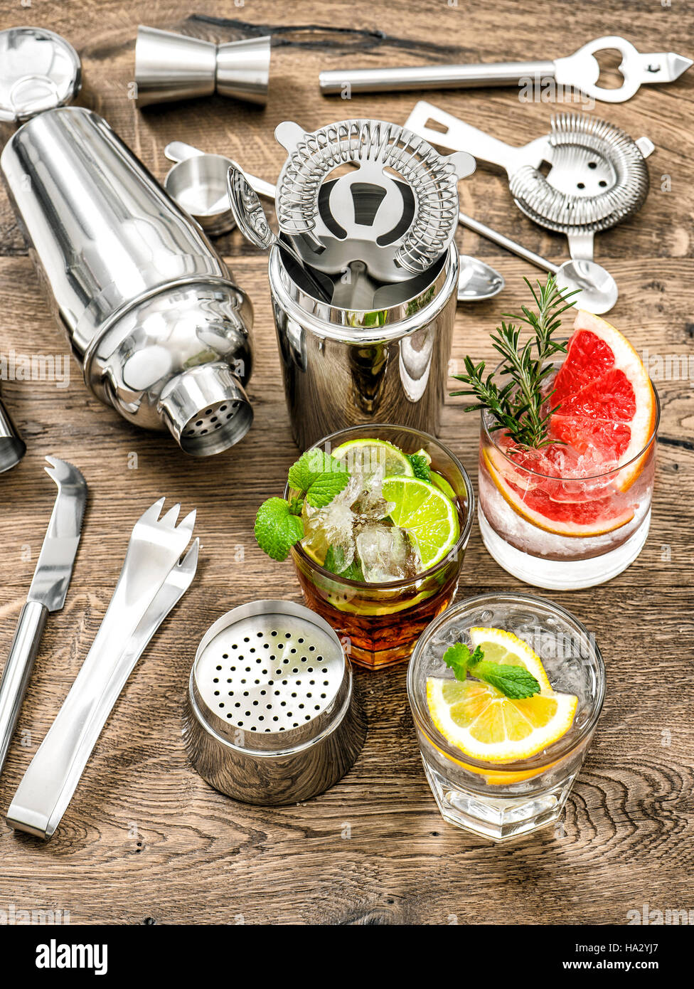 Cocktails with fruits and ice. Juice. Aperitif. Bar drink making tools Stock Photo