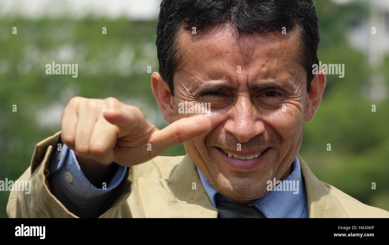 Smiling Man Finger Pointing Stock Photo