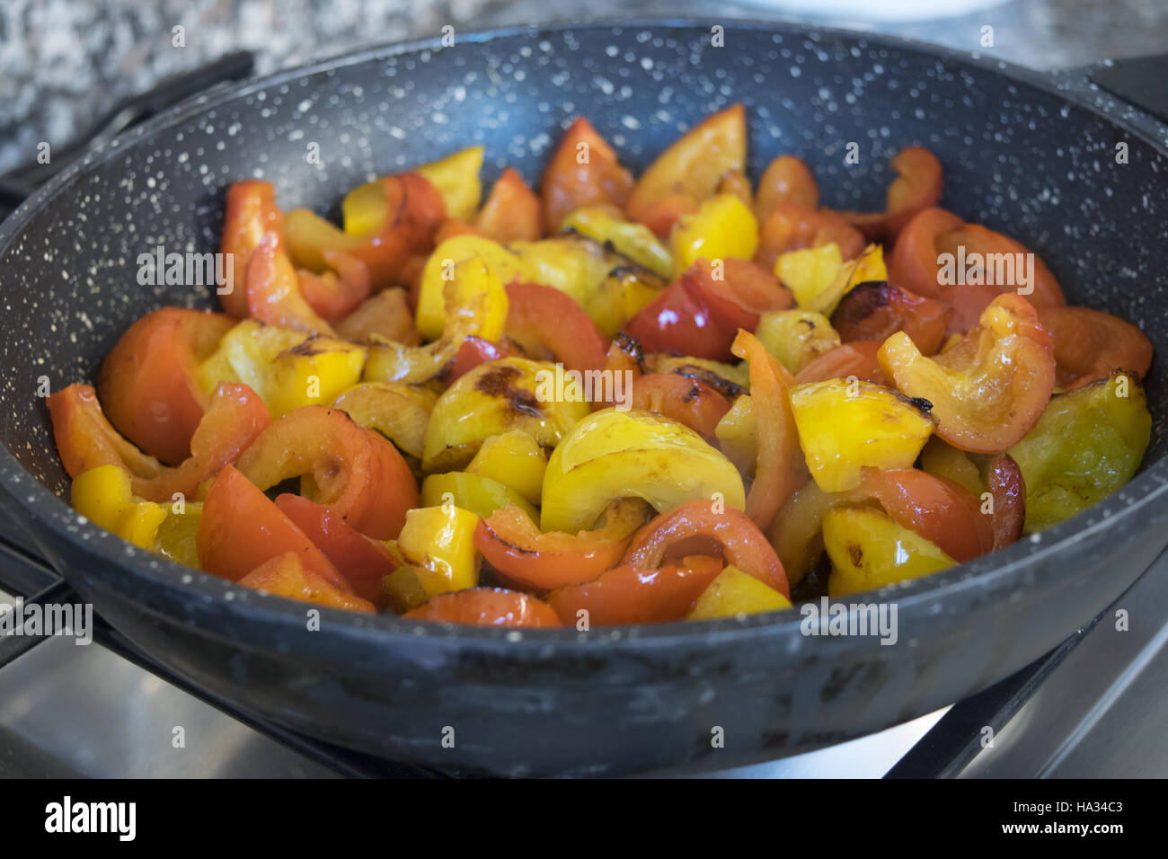 fied bell peppers in pan Stock Photo Alamy