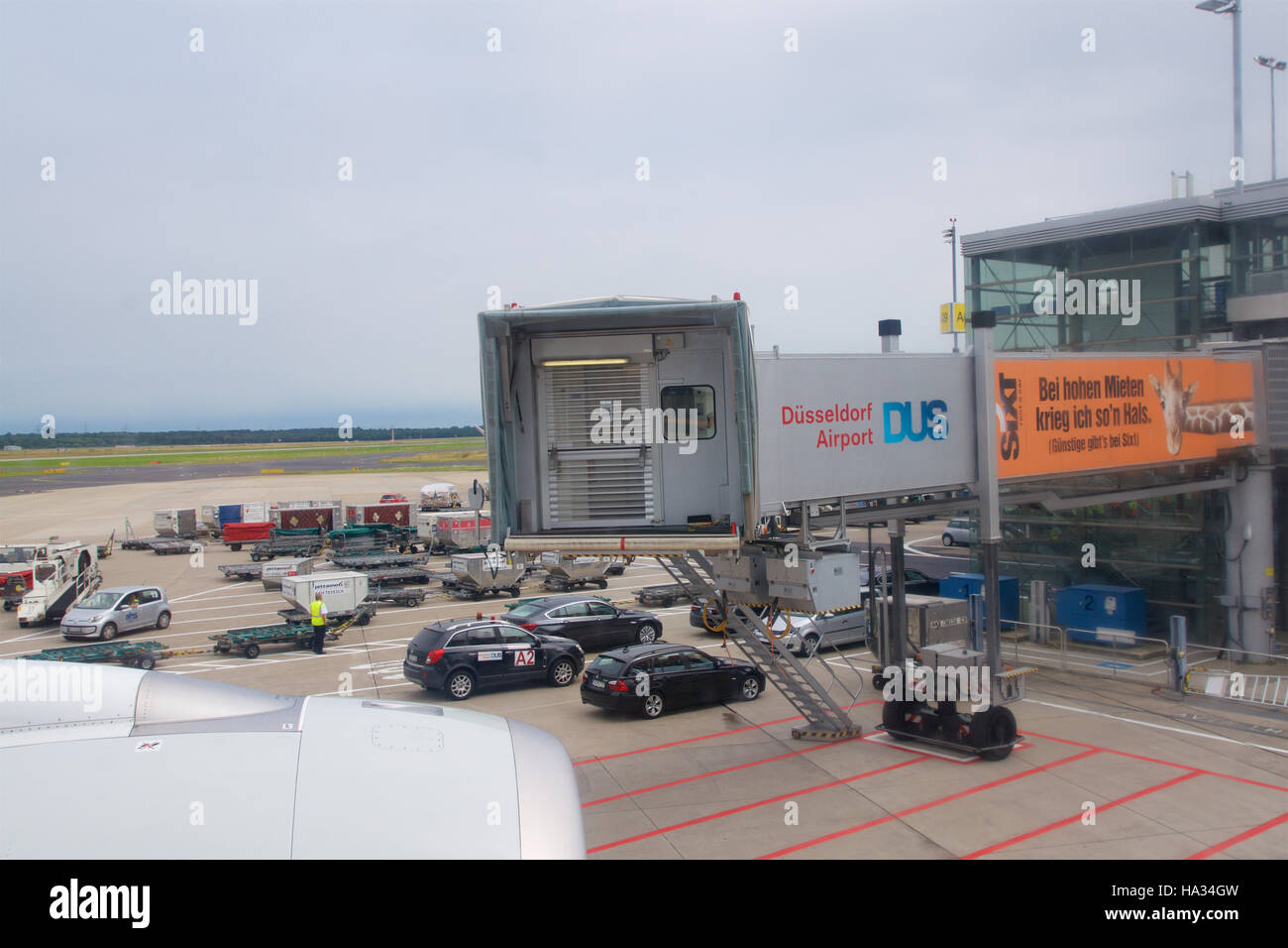 DUSSELDORF - 22nd JULY 2016: Airplane being preparing for takeoff at terminal gate, leaving the inaugural flight to Singapore Stock Photo