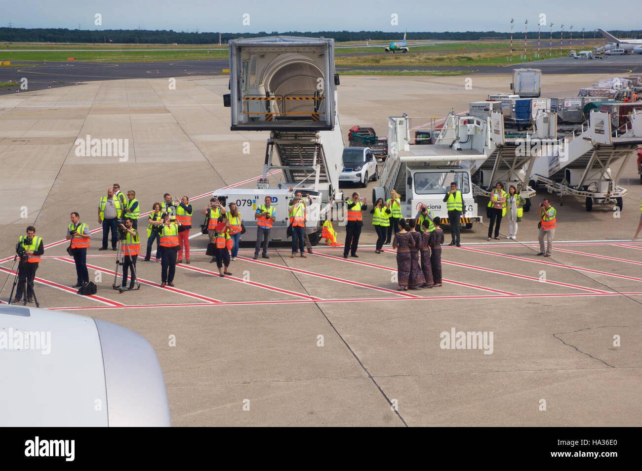 DUSSELDORF - 22nd JULY 2016: Airplane being preparing for takeoff at terminal gate, leaving the inaugural flight to Singapore Stock Photo