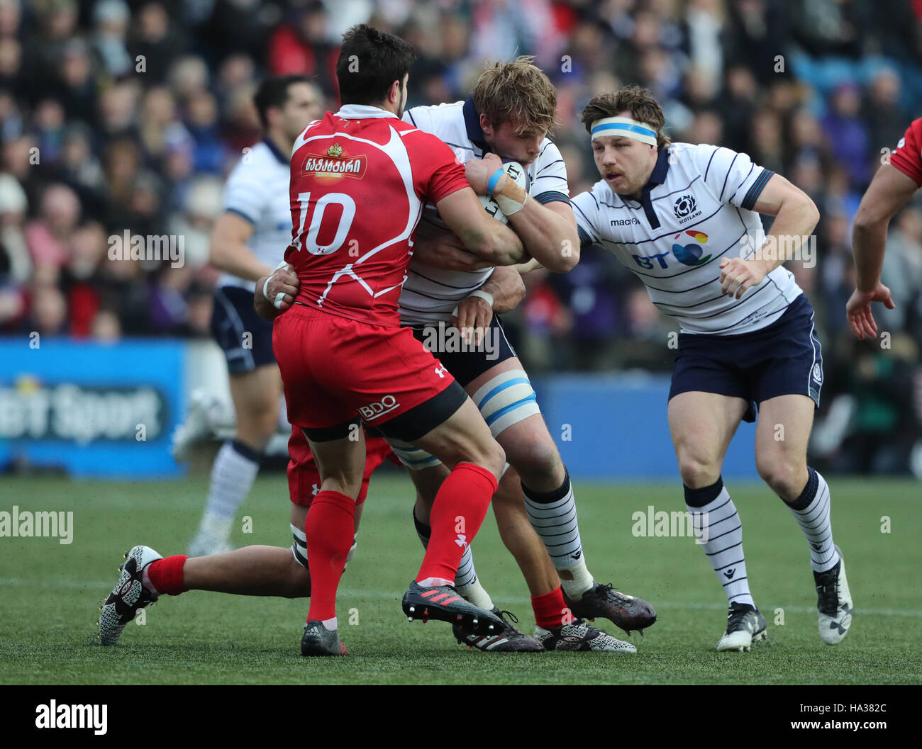 Scotland's Jonny Gray is brought down by the Georgia defence during the ...
