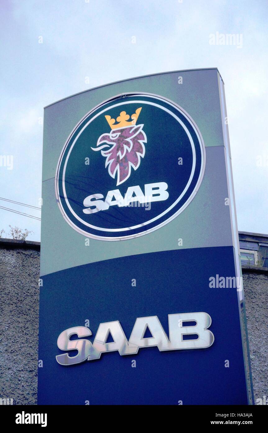 Sign with logo for a SAAB used car dealership in Dublin. The Swedish automaker went bankrupt in 2012. Stock Photo