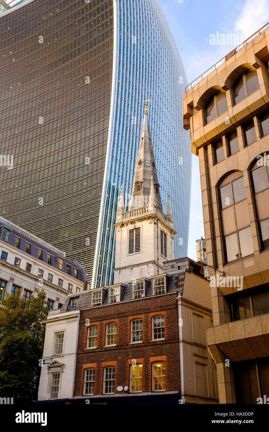 UK,England,City of London,Eastcheap-The Tower of Saint Margaret Pattens Anglican Church surrounded by office buildings Stock Photo