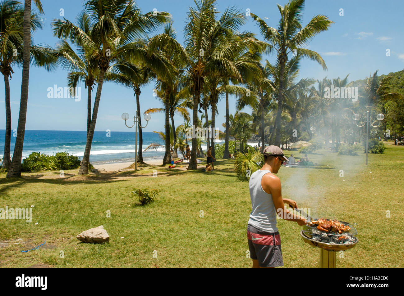 Grand Anse Beach (La reunion), France 29 December 2002 man roasting