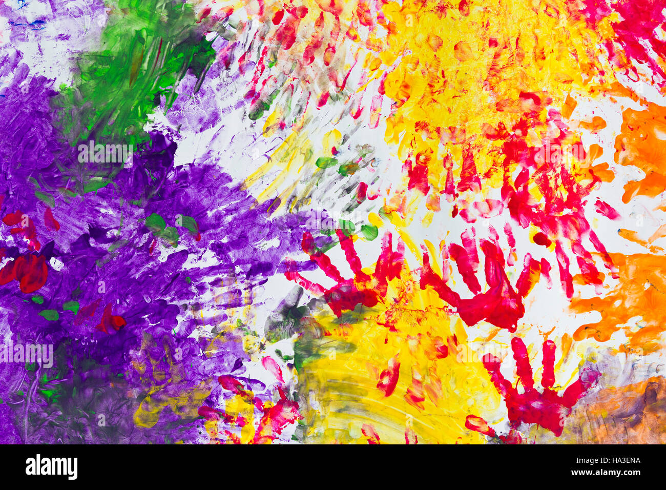 Colourful childrens' hand painting Stock Photo