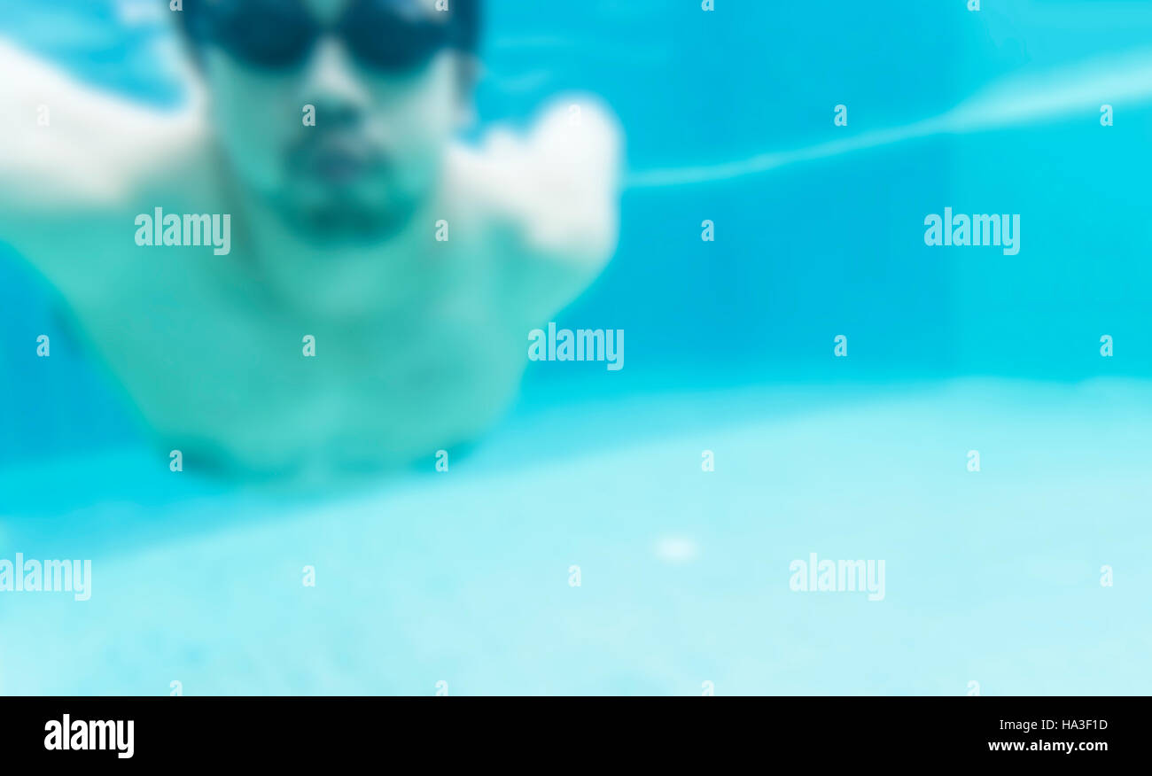 abstract blur of man in pool and free space for text editor - can use to display or montage on product Stock Photo