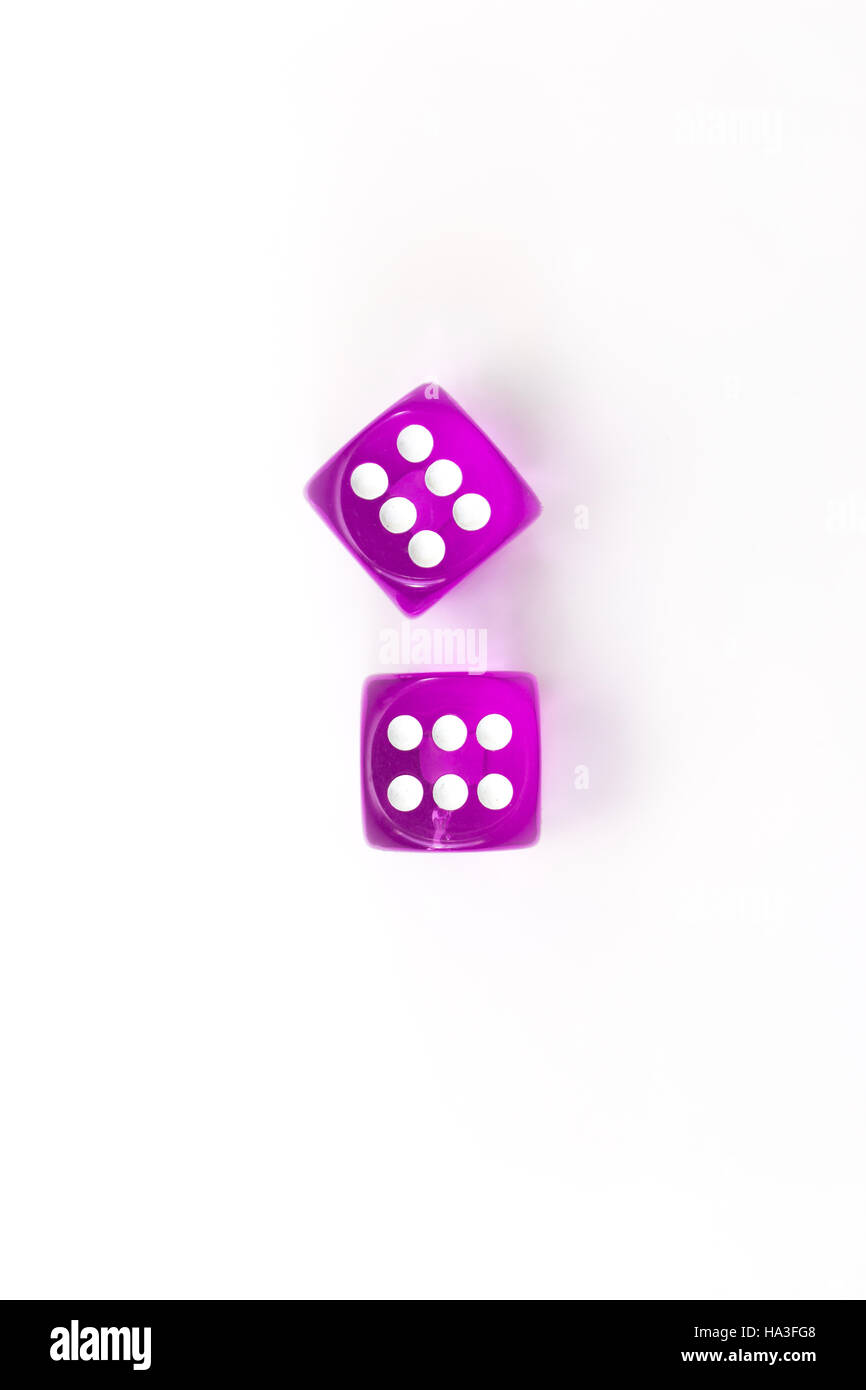 Purple colored isolated pair dice with a roll of 6 Stock Photo - Alamy