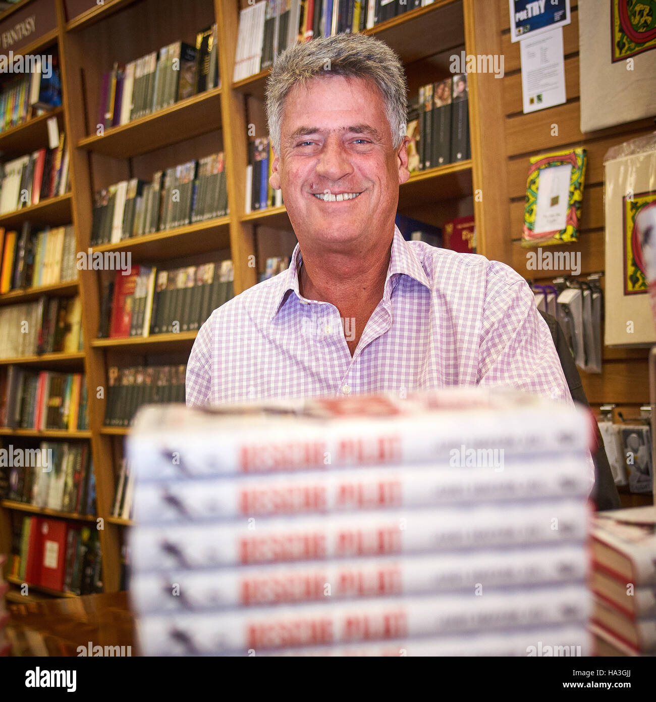 Former search and rescue helicopter pilot Jerry Grayson pictured in Cole's Bookshop during his book launch in Bicester Stock Photo