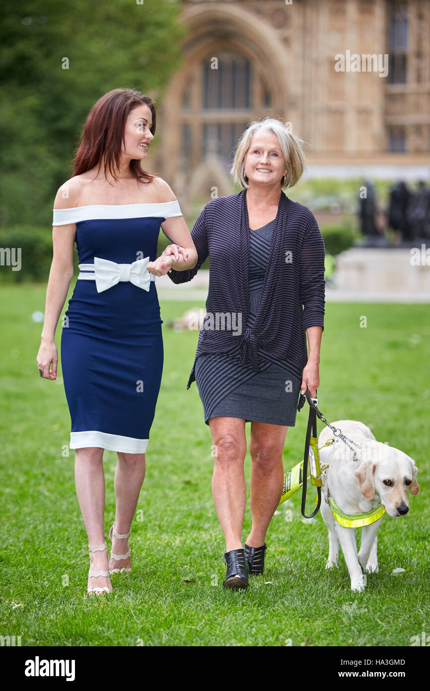 Reality TV star Jess Impiazzi with her blind mother Debbie Imiazzi and six year old guide dog Kacey Stock Photo