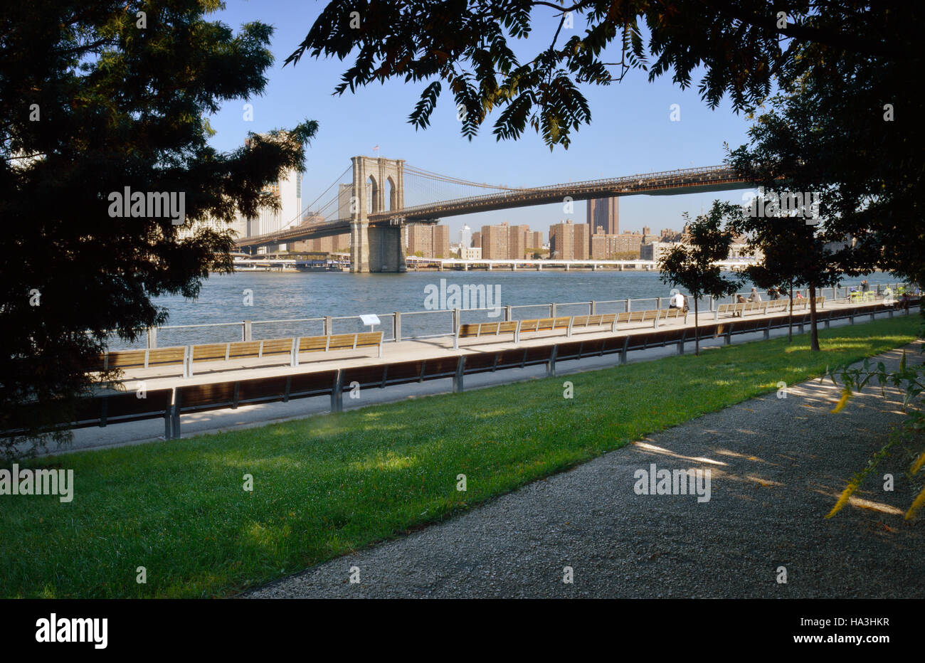 View of Manhattan from the Brooklyn Bridge Park. Stock Photo