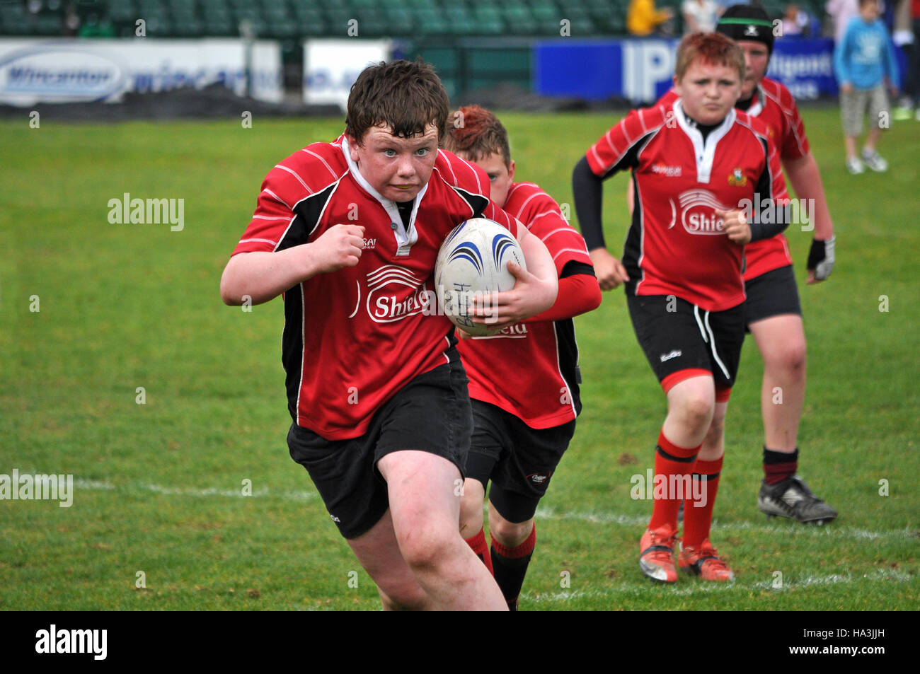teenage boys playing rugby Stock Photo