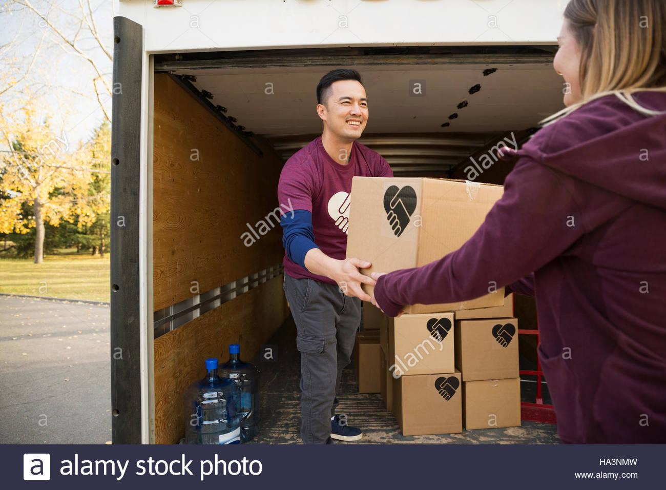 Loading boxes into truck hi-res stock photography and images - Alamy
