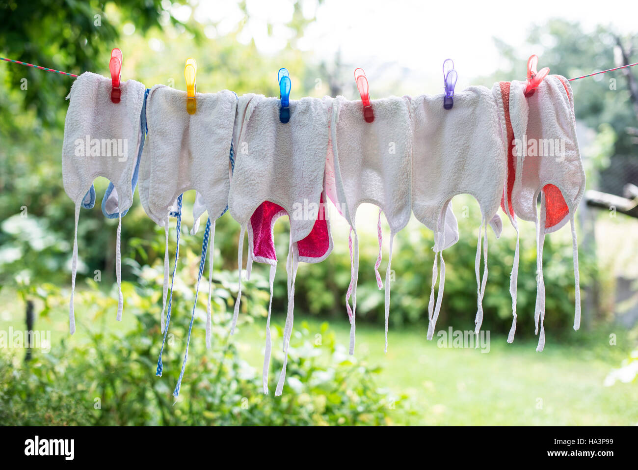 Baby bibs on laundry Stock Photo