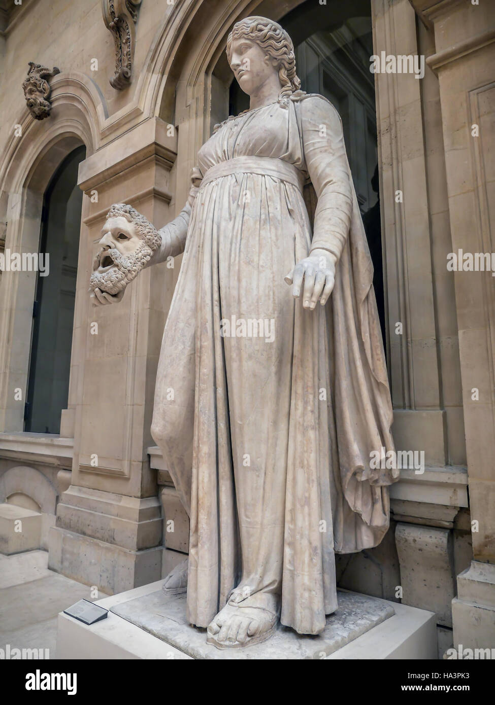 Colossal female statue, muse Melpomene. Marble, Roman artwork, ca. 50 BC. Louvre Museum Stock Photo