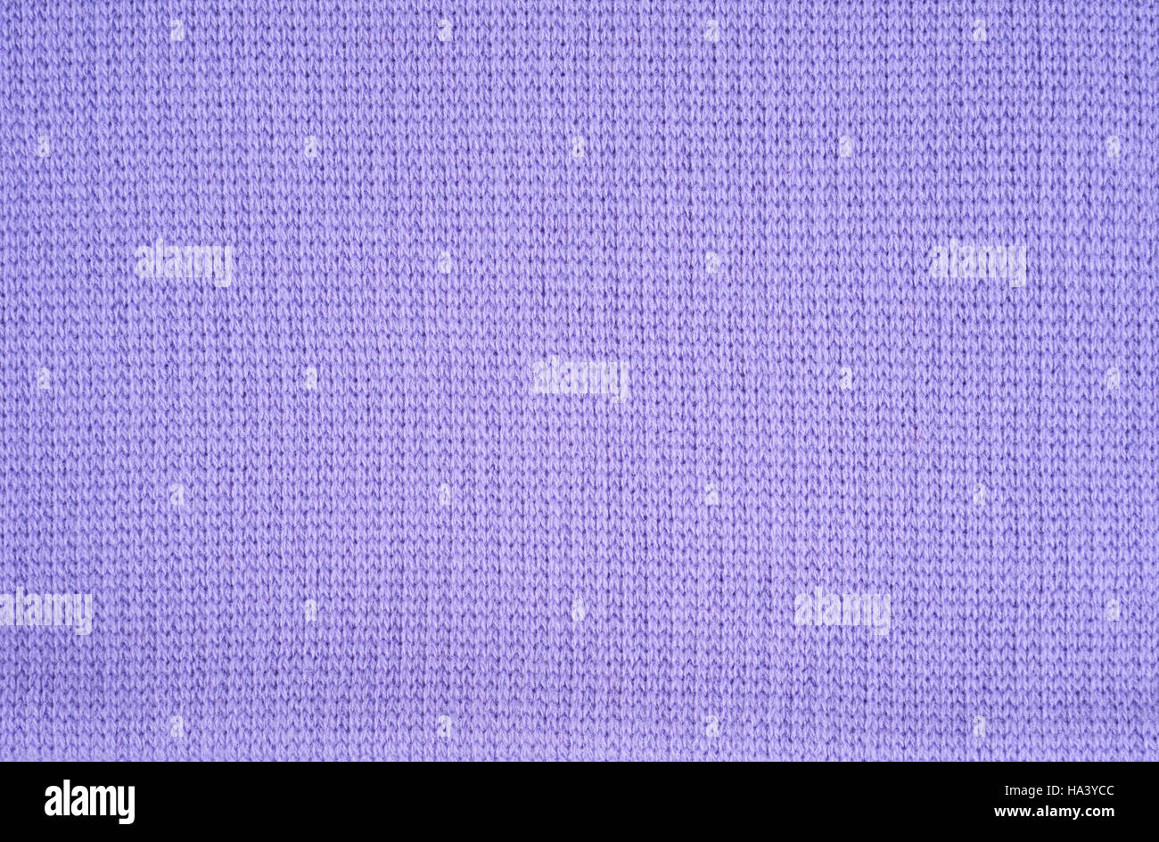 Violet knitted fabric as a seamless background Stock Photo