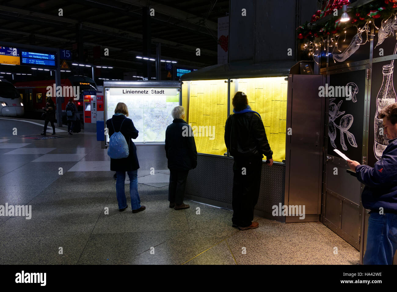 People looking at train timetable, Main station, Munich, Upper Bavaria, Germany, Europe, Stock Photo