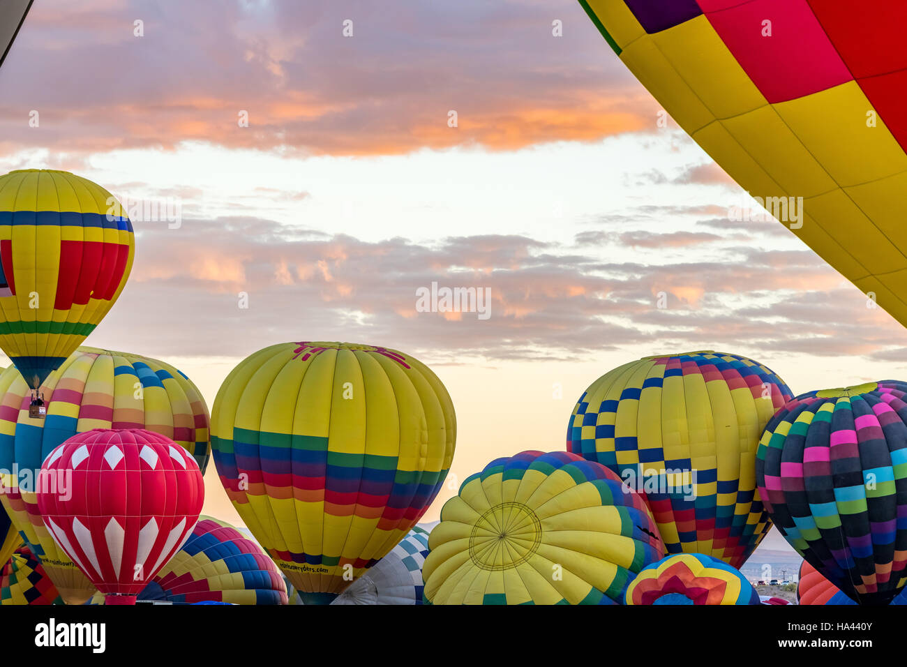 Hot Air Balloons fly over the city of Albuquerque, New Mexico during the mass ascension at the annual Hot Air Balloon Fiesta Stock Photo