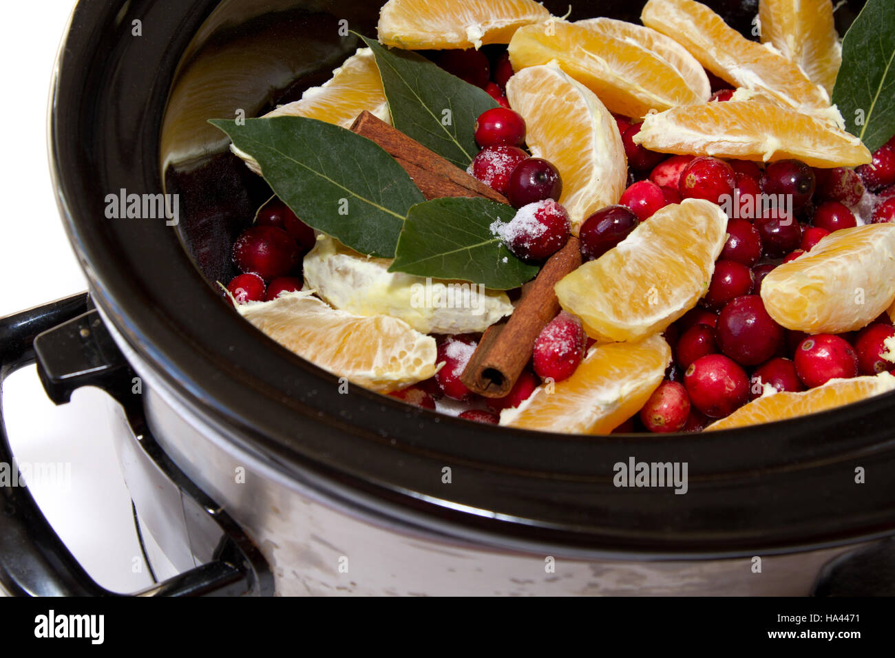 Hand turning the heat control knob on a vintage Prestige stoneware ' Crock-pot' - a stoneware slow cooker, made in the USA, popular in the early  1980s Stock Photo - Alamy