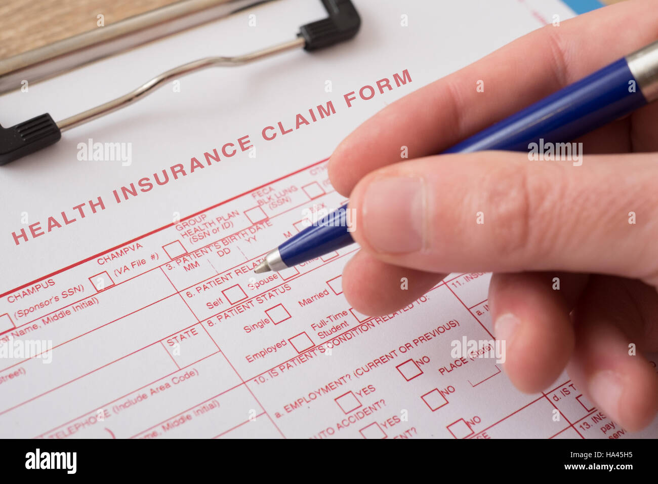 Health insurance claim form with pen Stock Photo