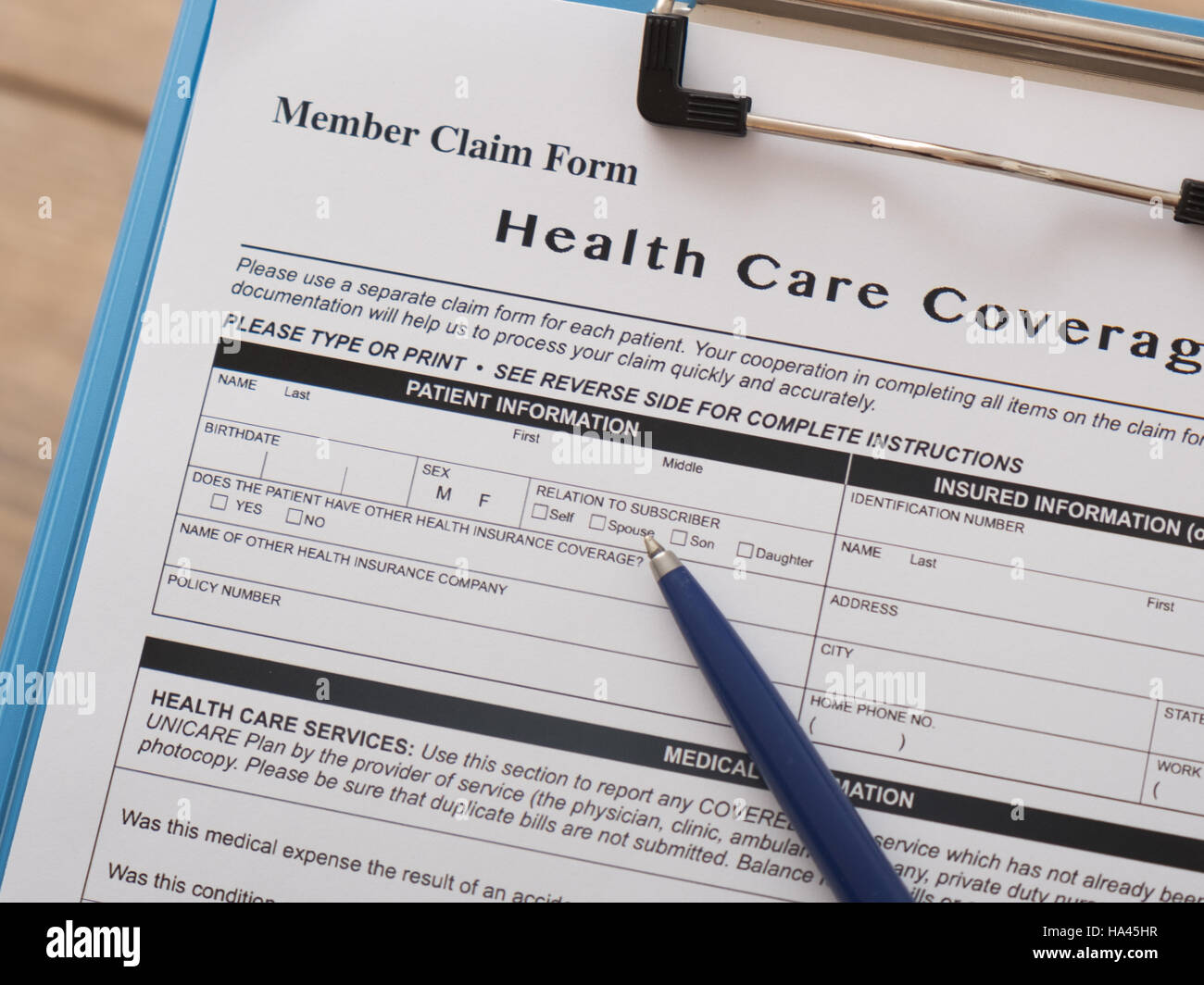 Health care insurance claim form with pen Stock Photo