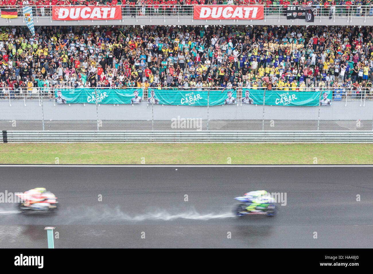 Riders race during the Malaysian Moto GP at Sepang, Malaysia Stock Photo