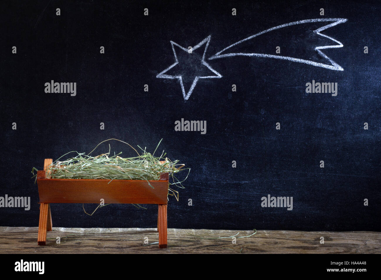 Birth of Jesus with manger and star on blackboard abstract christmas nativity scene Stock Photo