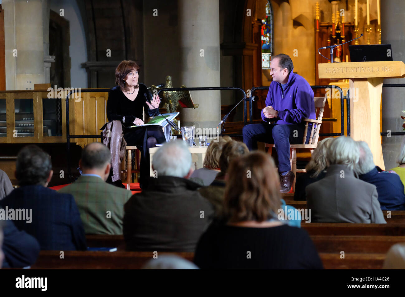 Hay Festival, Hay on Wye, Wales, UK - Saturday 26th November 2016 - Poet Mereid Hopwood talking to Guto Harri about the libretto Nes Daw - Cantata Memoria at the Hay Festival Winter Weekend. Stock Photo