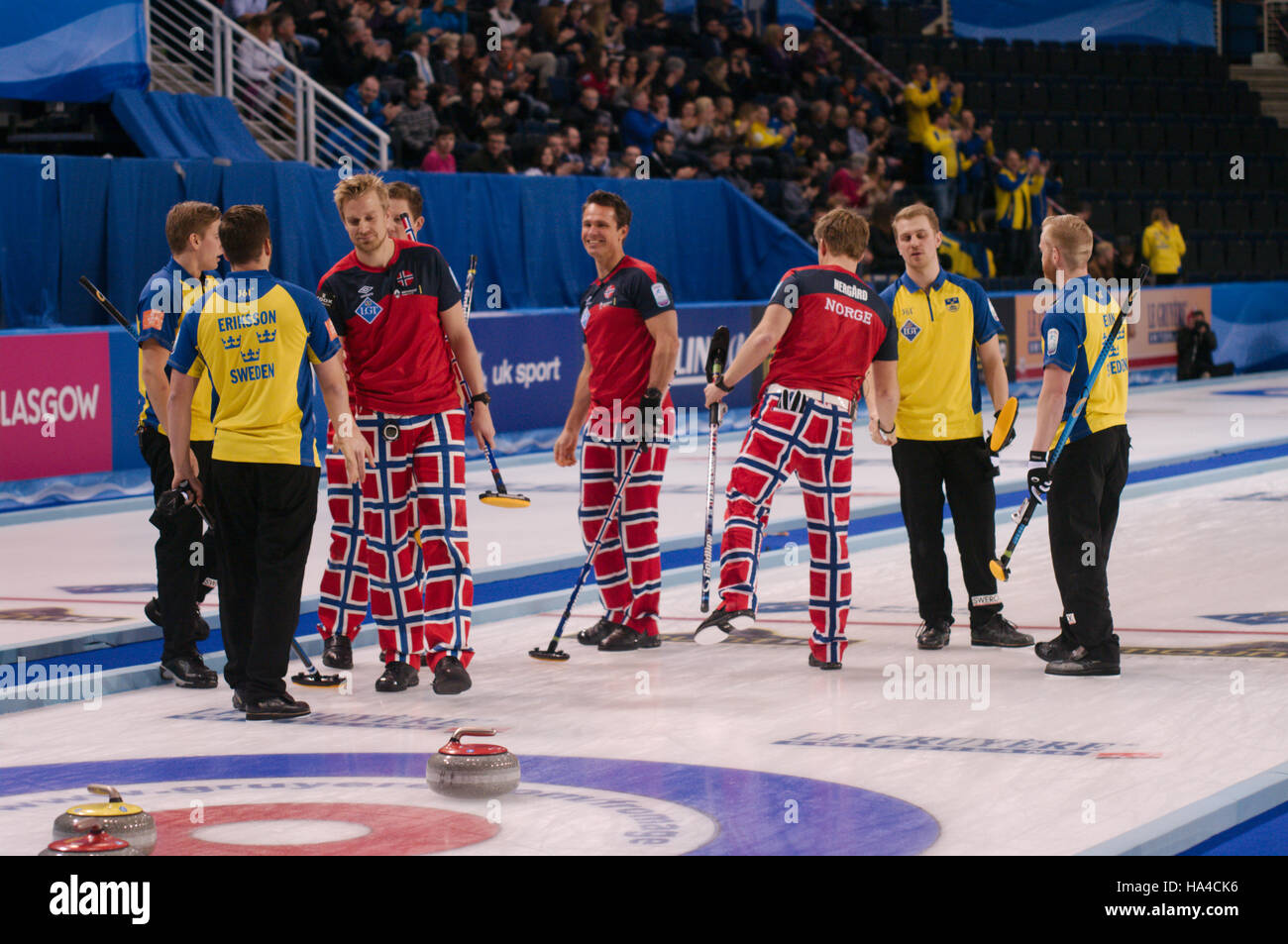 Braehead Arena, Renfrewshire, Scotland, 26 November 2016. Sweden shake hands with Norway after beating them in an extra end to win the Le Gruyère AOP European Curling Championships 2016  Credit:  Colin Edwards / Alamy Live News Stock Photo
