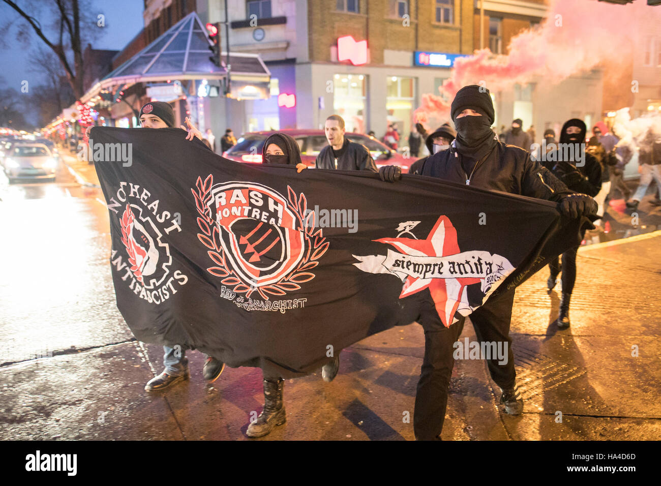 Montreal, Quebec, Canada. 26th November, 2016. Demonstrators protest against a concert by Polish black metal rock band Graveland. Protesters labelling themselves 'anti-fascists militants' were protesting what they call a racist band. Dario Ayala/Alamy Live News Stock Photo