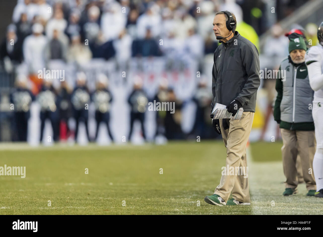 University Park, Pennsylvania, USA. 26th Nov, 2016. Michigan State Spartans head coach Mark Dantonio roams the sidelines in the first half during the game between Penn State Nittany Lions and Michigan State Spartans at Beaver Stadium. Credit:  Scott Taetsch/ZUMA Wire/Alamy Live News Stock Photo