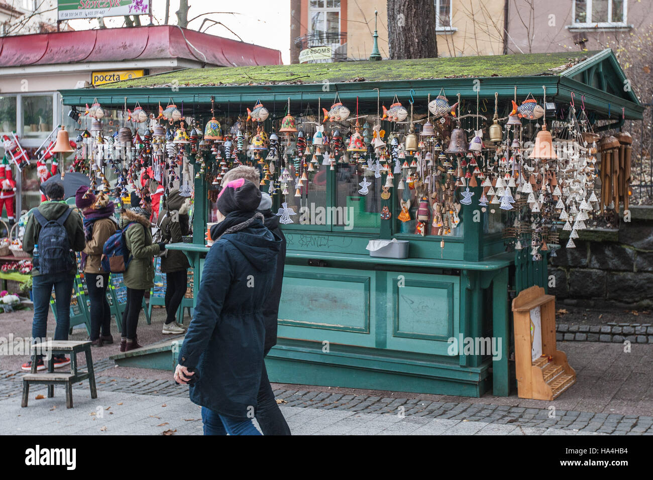 Sopot, Poland 27 November 2016 Cold day in Sopot. People wearing winter clothes walking in front of souvenirs shop at the Bohaterow Monte Cassiono street are seen Meteorologists predict high snow fall in next few hours. Credit:  Michal Fludra/Alamy Live News Stock Photo