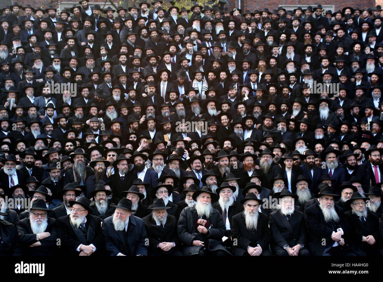 New York, New York, USA. 27th Nov, 2016. Rabbis are seen among a sea of ...