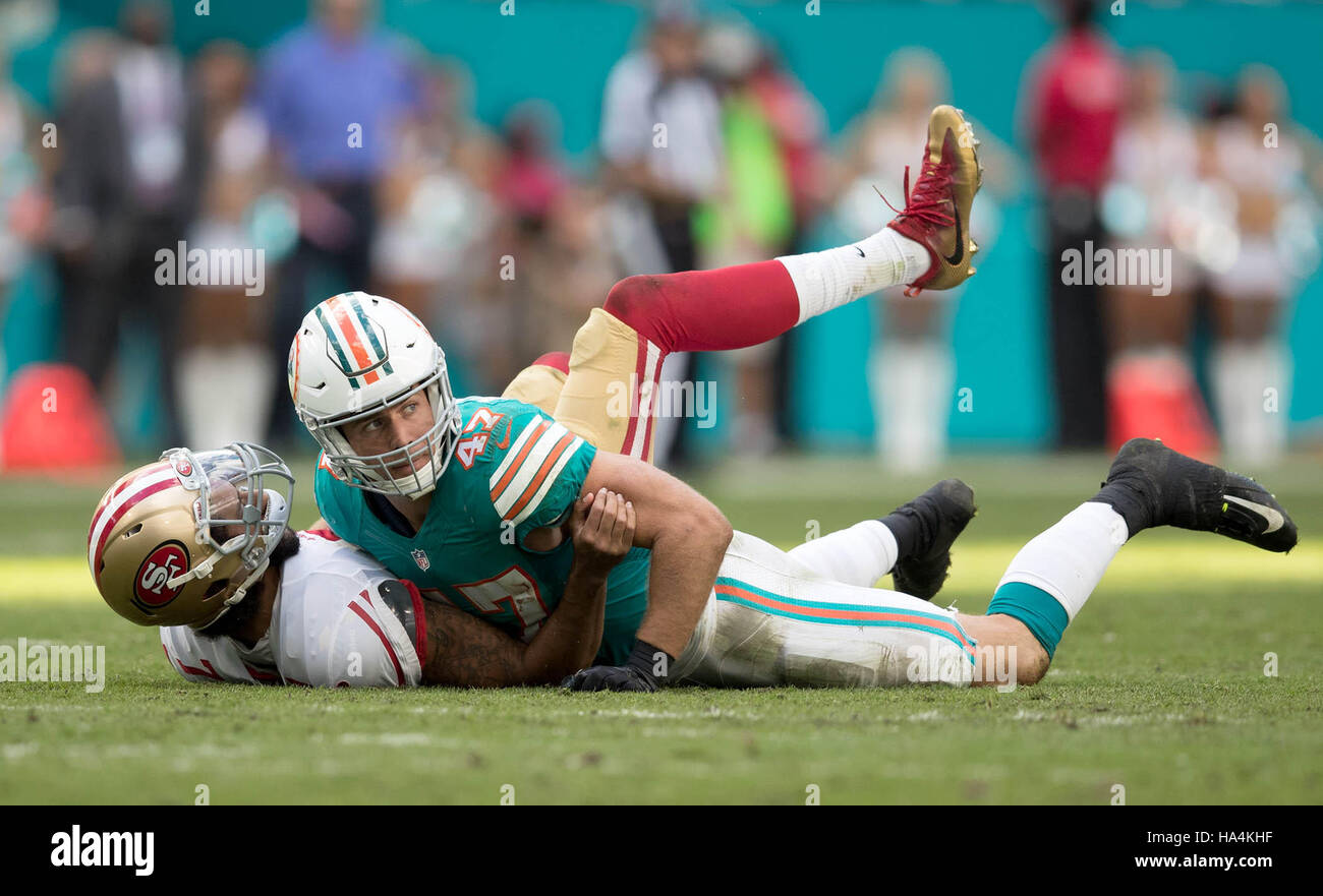 Miami Gardens, Florida, USA. 21st Oct, 2018. Detroit Lions wide receiver  GOLDEN TATE (15) holds on to a long pass, tackled by Miami Dolphins  linebacker KIKO ALONSO (47), during a NFL football