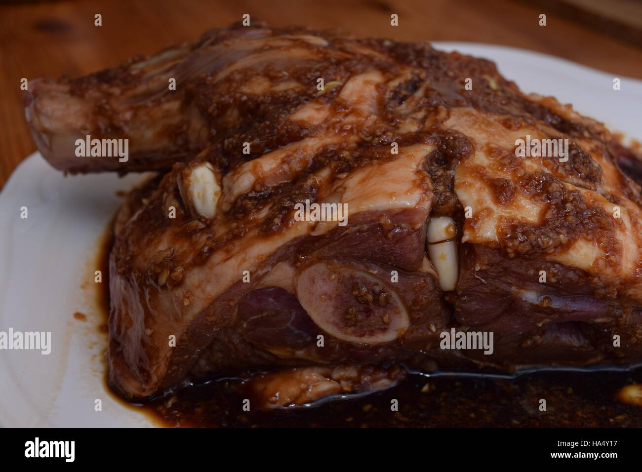 Delicious lamb marinade on a Lamb shoulder Stock Photo - Alamy