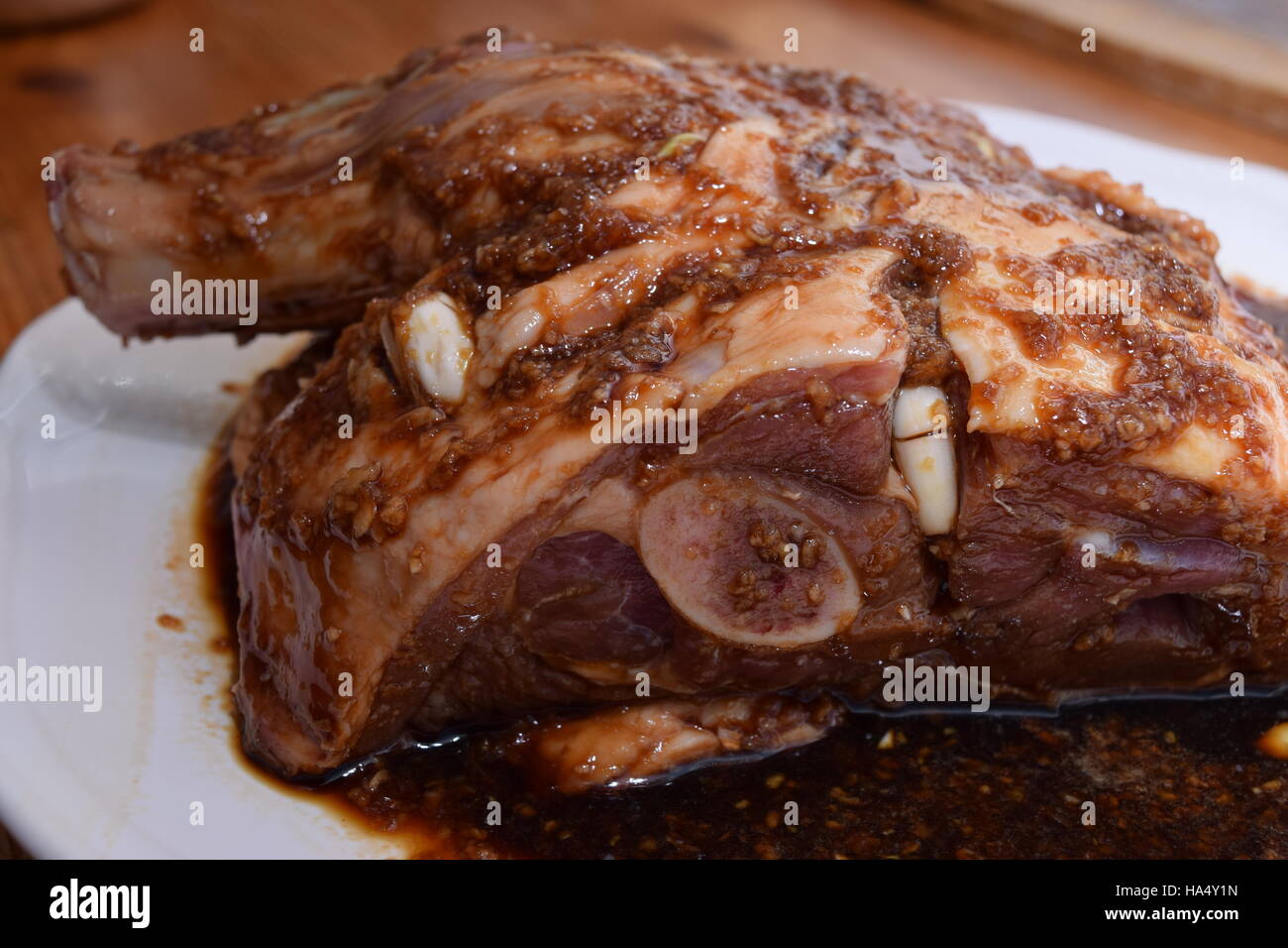 Lamb shoulder in marinade Stock Photo - Alamy