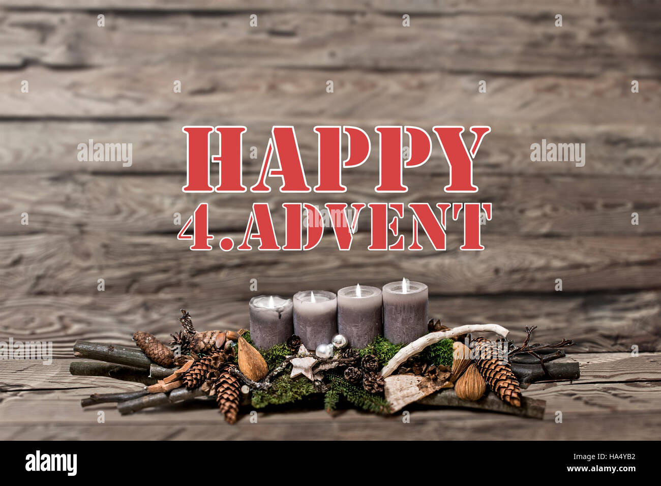 Merry Christmas decoration advent with burning grey candle Blurred background text message englisch 4th Stock Photo