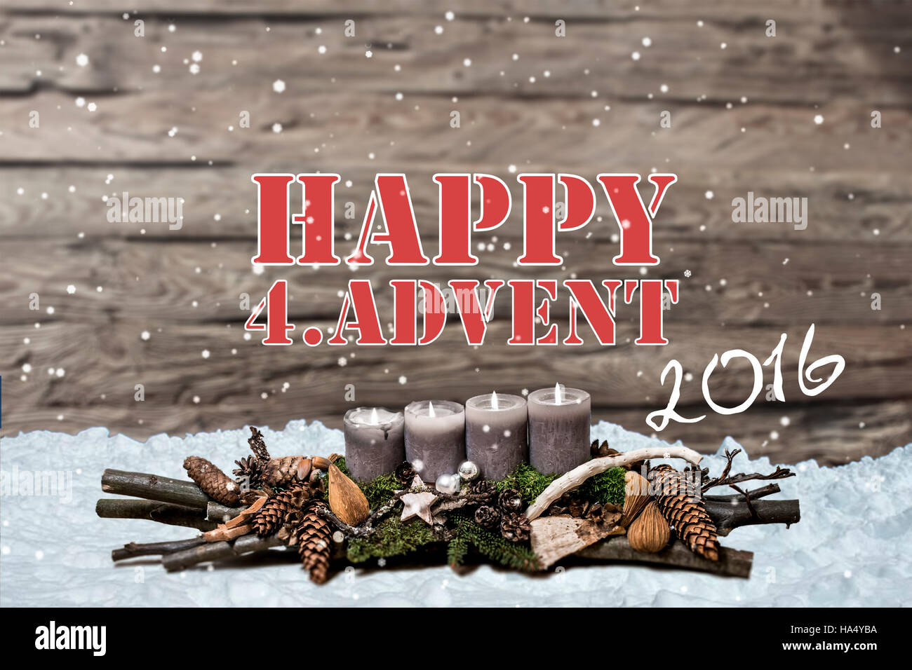 Merry Christmas decoration advent 2016 with burning grey candle Blurred  background snow text message englisch 4th Stock Photo - Alamy, image size:1300x956