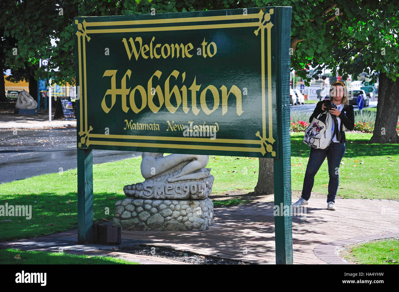 'Welcome to Hobbiton' sign and statue of Gollum, Broadway, Matamata, Waikato Region, North Island, New Zealand Stock Photo