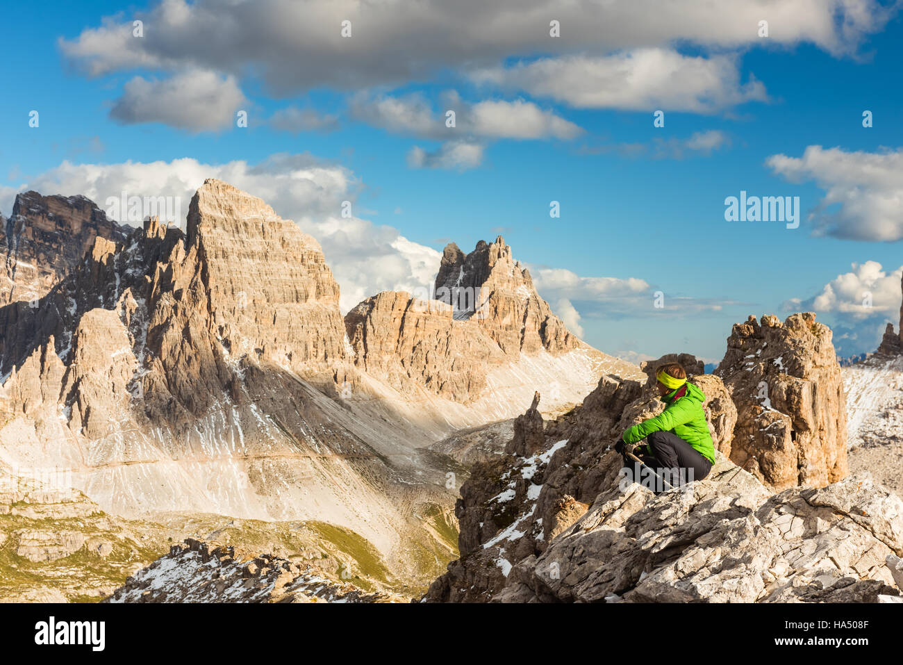 Hiker enjoying view from top of mountain Stock Photo