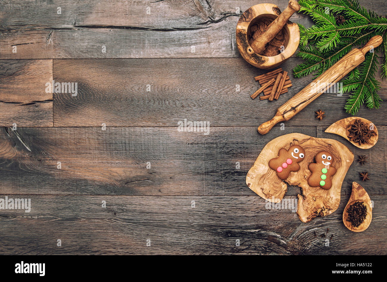Christmas gingerbread  cookies, spices and baking tools. Vintage style toned picture Stock Photo