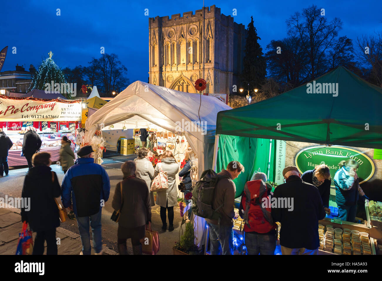 Bury St Edmunds Christmas Market Angel Hill, view of people looking at