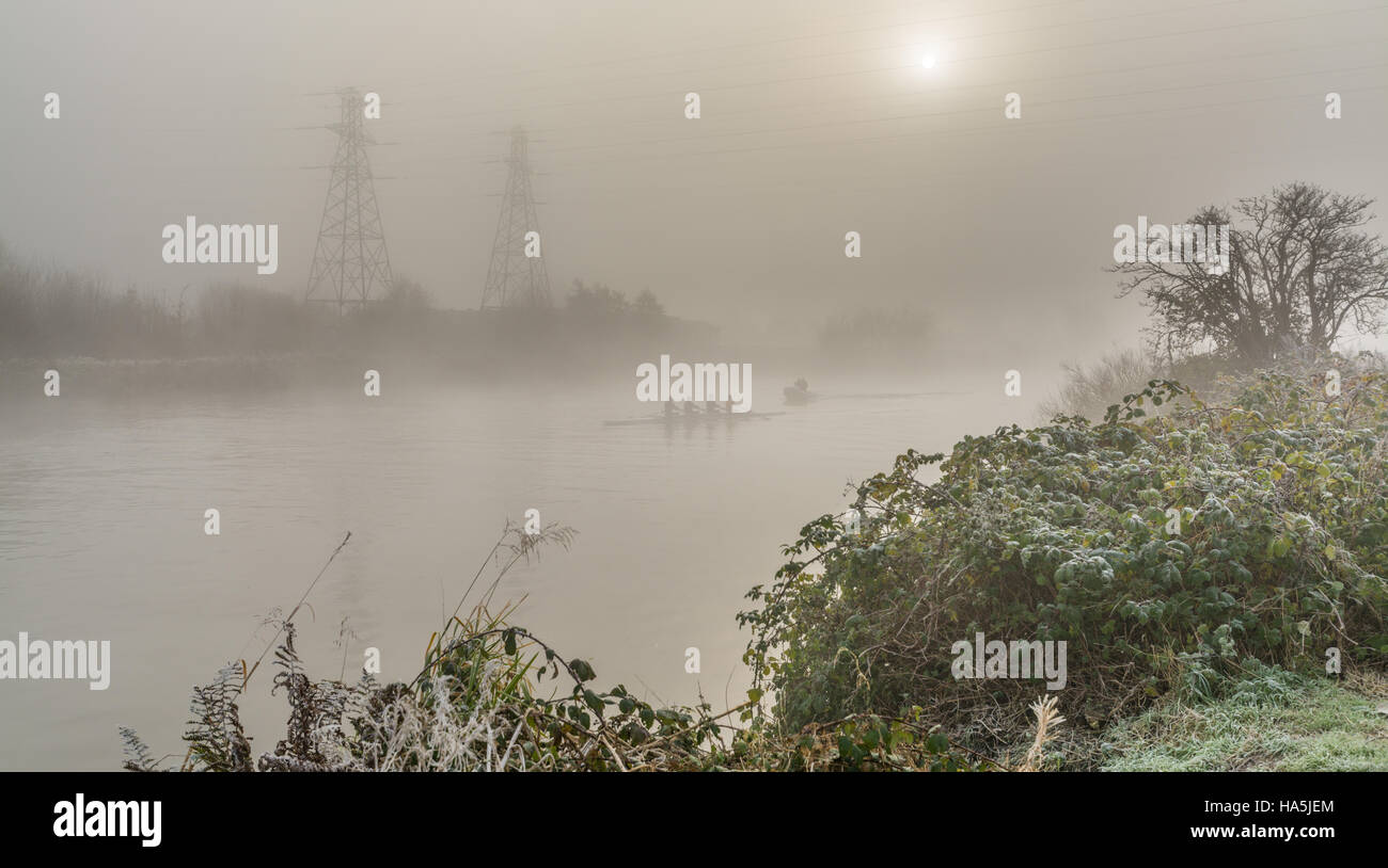Rowers in the mist on the River Mersey in Warrington,  A cold/frosty Saturday morning. Stock Photo