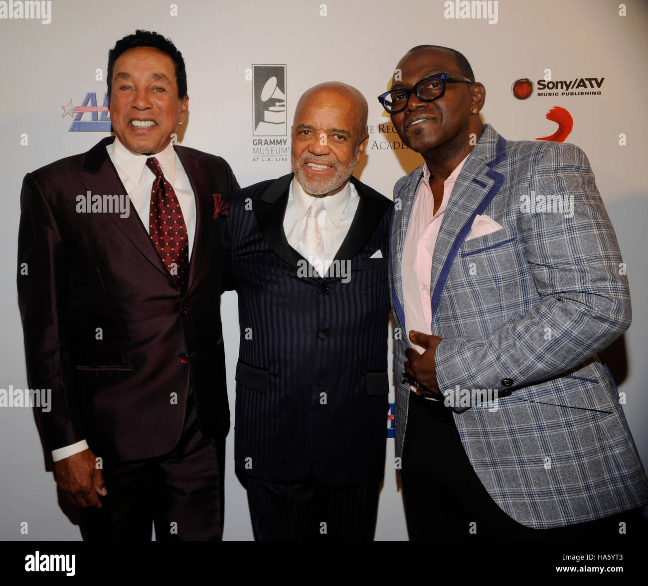 (L-R) GRAMMY winner Smokey Robinson, Motown founder Berry Gordy and Randy Jackson honored at the first-ever Architects of Sound Awards at the GRAMMY Museum on November 11, 2013 in Los Angeles, California. Stock Photo