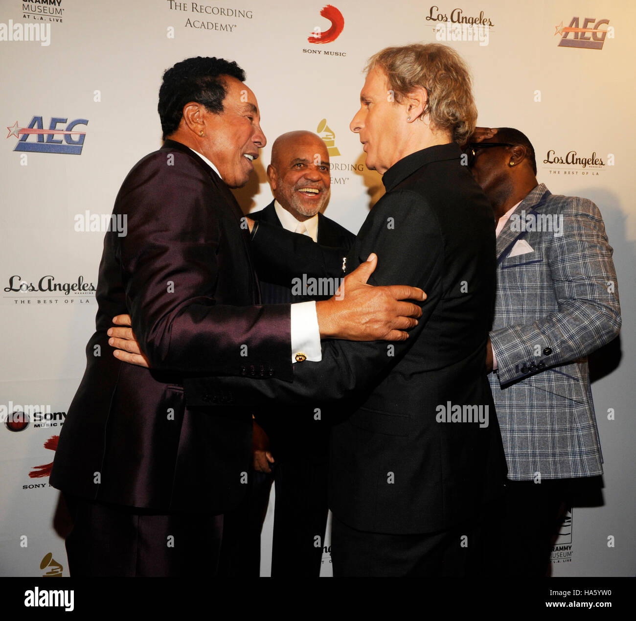 (L-R) GRAMMY winner Smokey Robinson, Motown founder Berry Gordy, Michael Bolton and Randy Jackson honored at the first-ever Architects of Sound Awards at the GRAMMY Museum on November 11, 2013 in Los Angeles, California. Stock Photo