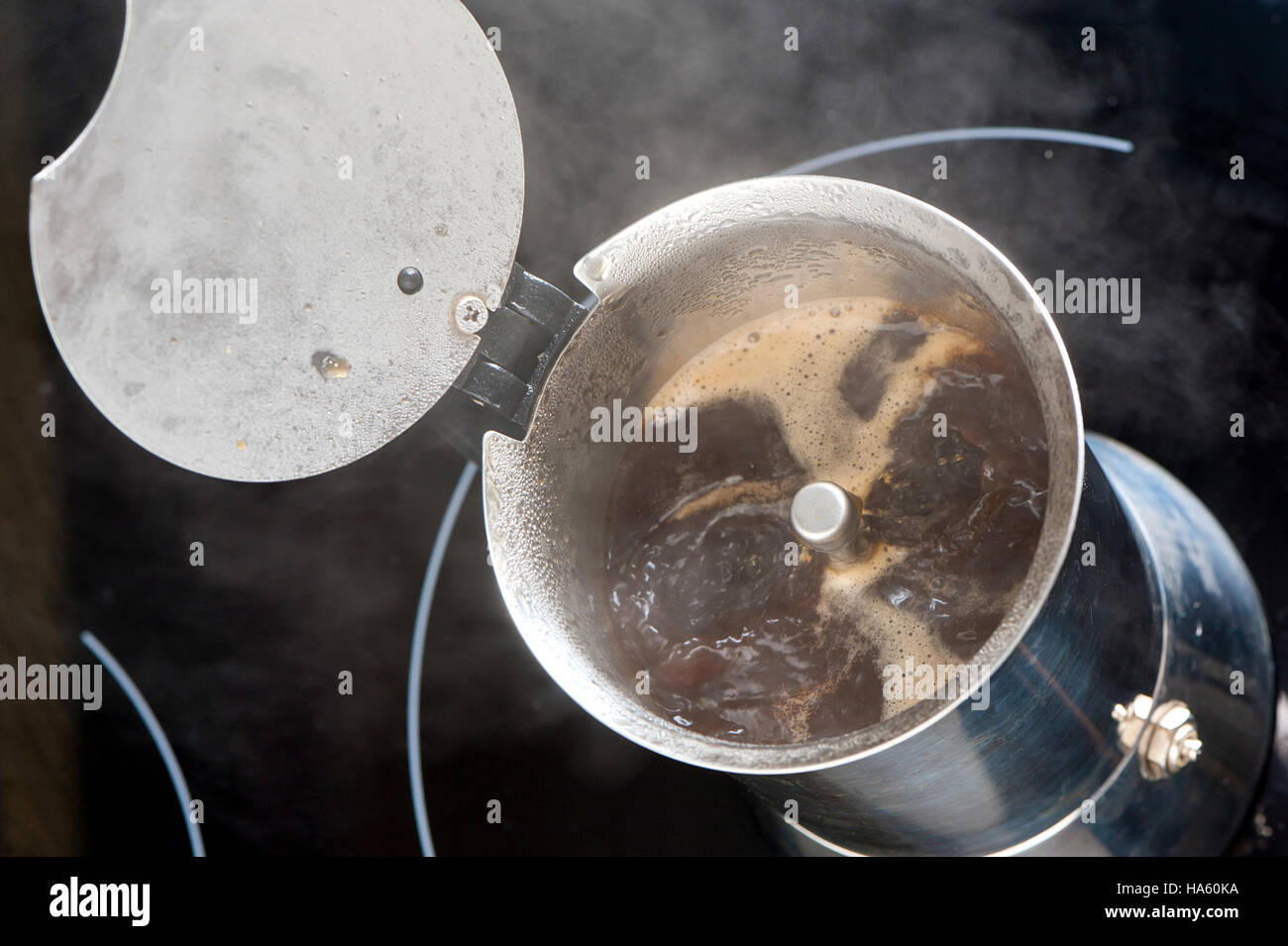 brewing coffee in moka pot Stock Photo Alamy